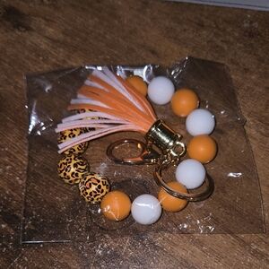 Orange and White Beaded Keychain with Tassel